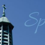 Marian Hall steeple with spring blossoms