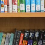 books lined up on a shelf