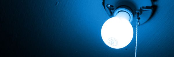 light bulb on in dark room