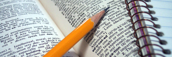 pencil on dictionary