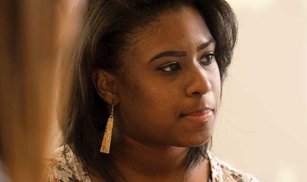 student looking off into the distance with a thoughtful look