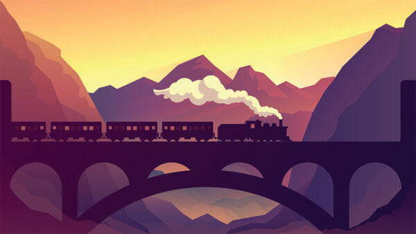 train going over bridge during sunset in a valley of mountains