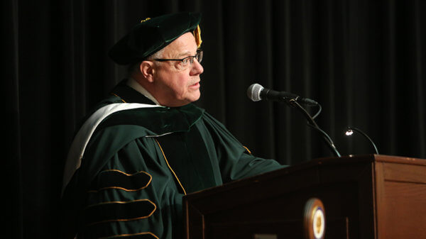 Dr. Gamble giving speech at 2018 Commencement