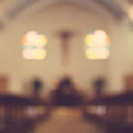 blurred image of inside a chapel