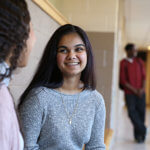 Smiling Students in Hallway