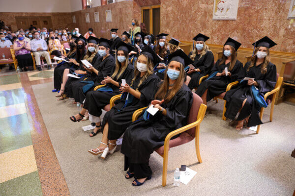 Graduates seated at ceremony